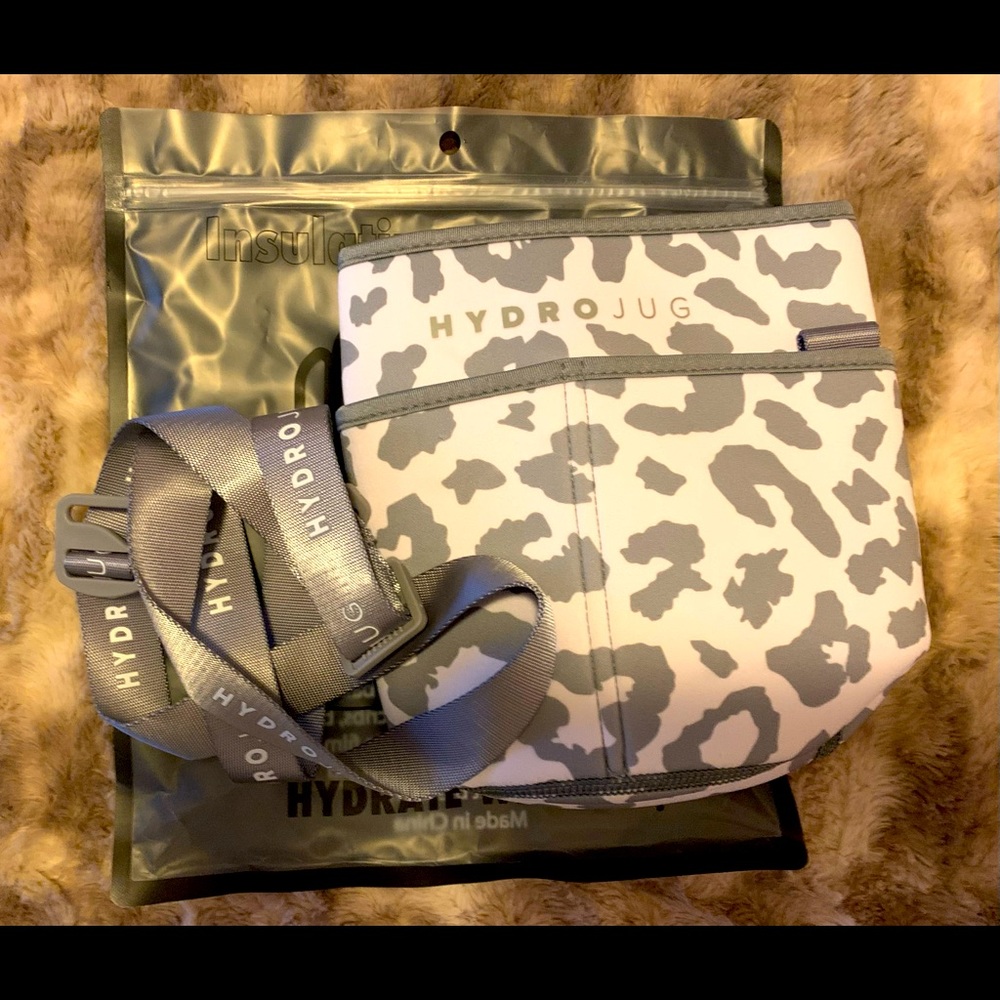 Hydrojug white leopard print canvas sleeve with holding strap.